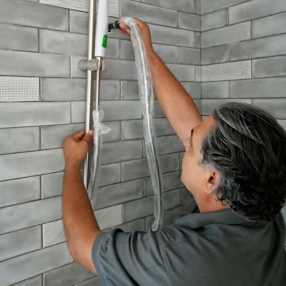 remodeling contractor erik kalabat working on a bathroom remodel